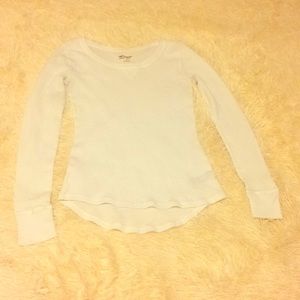 A small, light, white sweater (For teens)